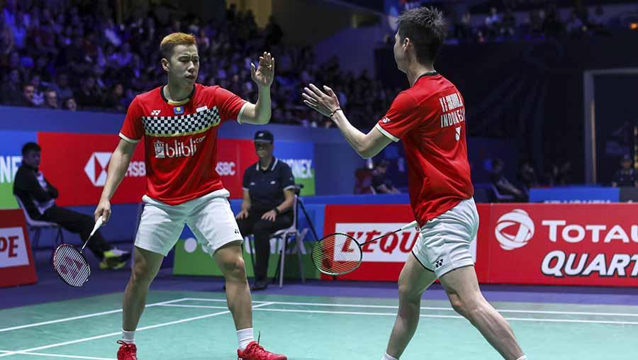 Pasangan ganda putra andalan Indonesia Kevin Sanjaya/Marcus Gideon berpeluang ukir rekor jika juara Hong Kong Open 2019. - INDOSPORT