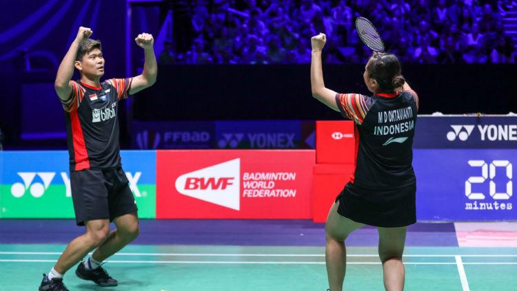 Slebrasi Praveen Jordan/Melati Daeva Oktavianti usai mengalahkan Zheng Siwei/Huang Yaqiong di final French Open 2019