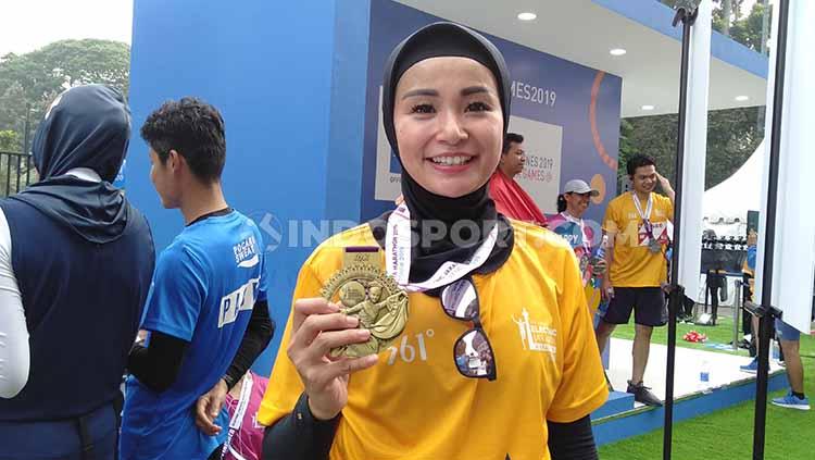 Artis kenamaan Indonesia, Soraya Larasati pancarkan aura memikat ketika asyik bakar kalori saat Ramadan.