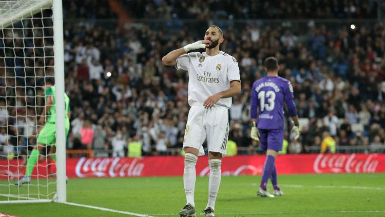 Striker Real Madrid, Karim Benzema, mencetak gol kedua ke gawang Leganes pada pekan ke-11 LaLiga di Santiago Bernabeu, Rabu (31/10/19) dini hari WIB. Copyright: Gonzalo Arroyo Moreno/Getty Images