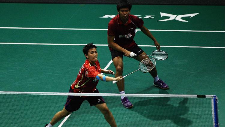 Praveen Jordan ketika berpasangan dengan Vita Marissa di turnamen bulutangkis 2013 silam. Copyright: Hannah Peters/Getty Images