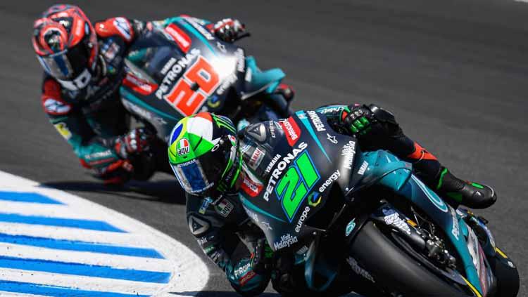Fabio Quartararo (no20) berhasil melewati garis finish pertama di free practice GP Malaysia. - INDOSPORT