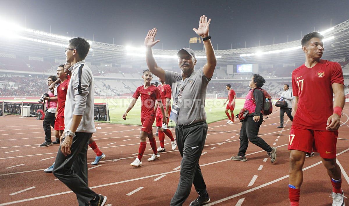 Ekspresi kebahagiaan pelatih Timnas Indonesia U-19, Fakhri Husaini usai anak asuhnya mengimbangi Korea Utara dan lolos ke Piala Asia U-19 2020.