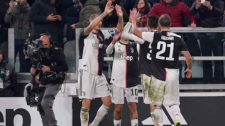 Aksi selebrasi pemain Juventus setelah Paulo Dybala mencetak gol ke gawang AC Milan pada laga Serie A Italia di Allianz Stadium.