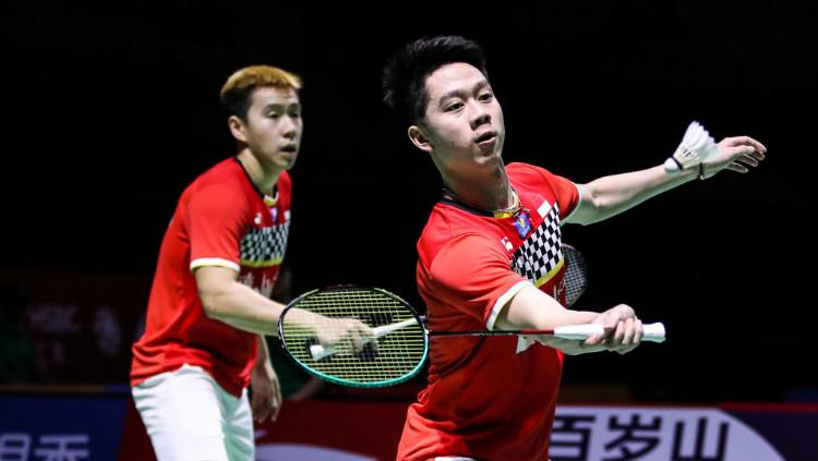 Aksi Kevin Sanjaya bersama Marcus Gideon di final Fuzhou China Open 2019, Minggu (10/11/19). Copyright: Shi Tang/Getty Images