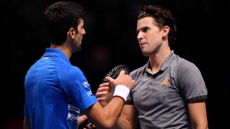 Novak Djokovic dan Dominic Thiem di Nitto ATP Finals 2019. - INDOSPORT