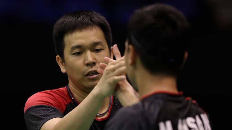 Hendra Setiawan meninggalkan pasangannya, Mohammad Ahsan dan menjajal profesi wasit di eksibisi Kejurnas PBSI 2019.