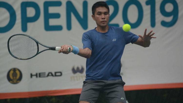 Muhammad Rifqi Fitriadi melangkah ke babak perempatfinal BNI Tennis Open 2019.
