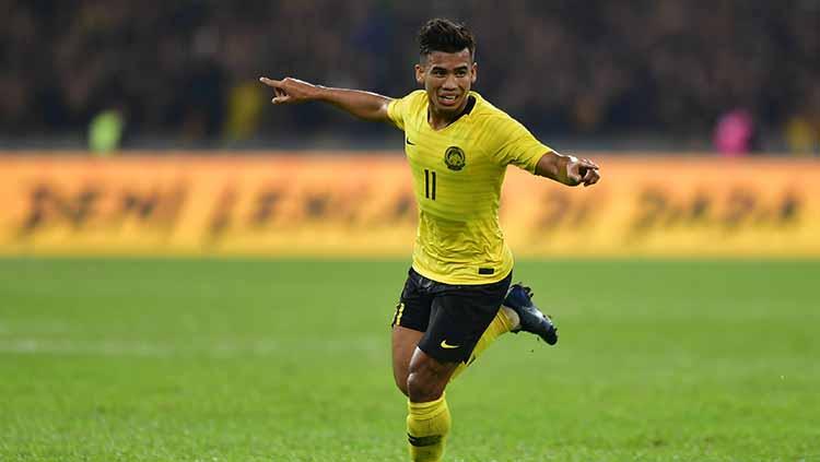 Muhammad Safawi Rasid melakukan selebrasi usai cetak gol ke gawang timnas Indonesia.