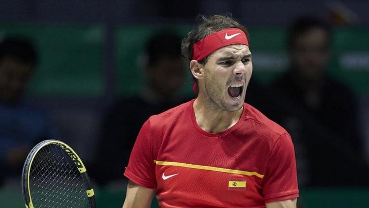 Rafael Nadal saat membawa Spanyol memastikan gelar juara turnamen tenis dunia, Piala Davis 2019 mengalahkan Kanada, Senin (25/11/19) dini hari WIB.