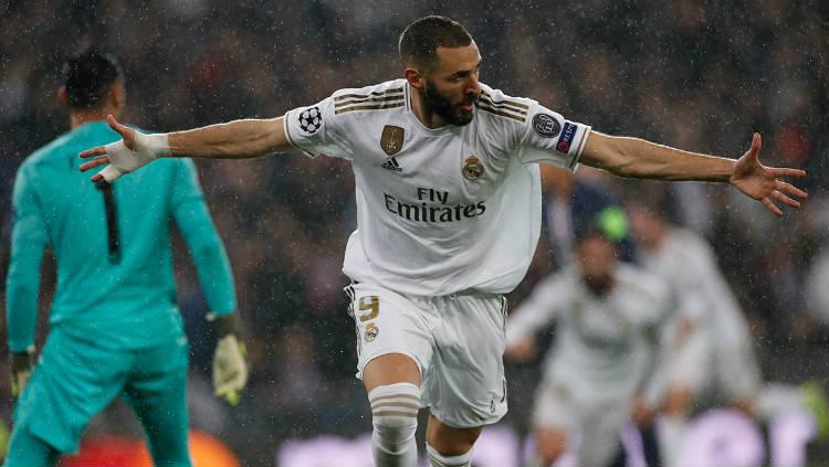 Karim Benzema cetak gol ke gawang Paris Saint Germain (PSG) di laga Liga Champions, Rabu (27/11/19) dini hari WIB. Copyright: Real Madrid