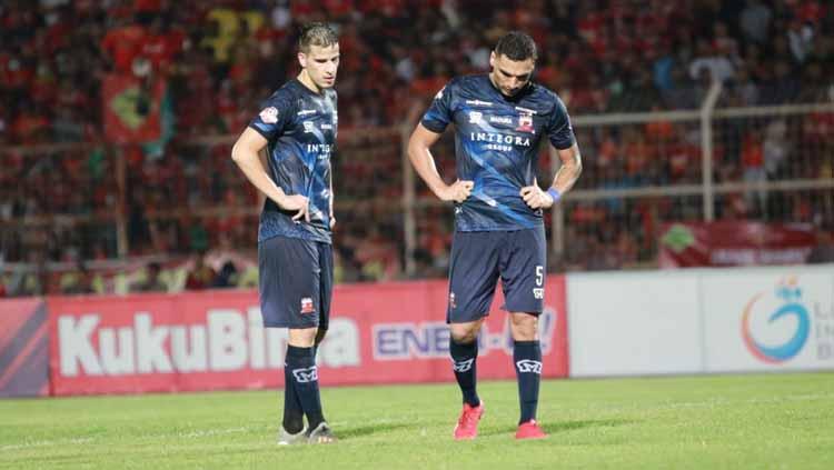 Jaimerson Xavier (kanan) dirumorkan tidak akan kembali ke Persija Jakarta usai dilepas Madura United beberapa hari yang lalu. - INDOSPORT