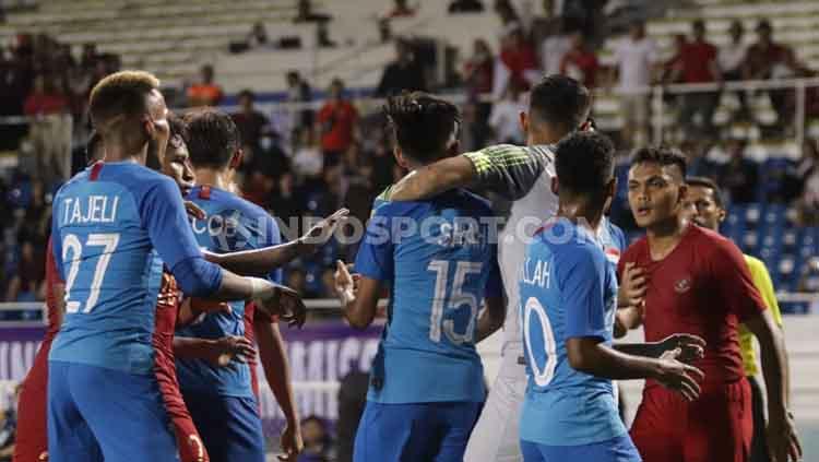 Peluang Timnas Indonesia U-23 untuk lolos ke semifinal SEA Games 2019 menjadi berat usai kalah 1-2 dari Vietnam, tapi Singapura siap 'membantu' Garuda Muda.