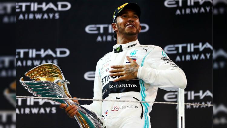 Lewis Hamilton juara Formula 1 2019 usai menang di GP Abu Dhabi, Minggu (01/12/19). - INDOSPORT