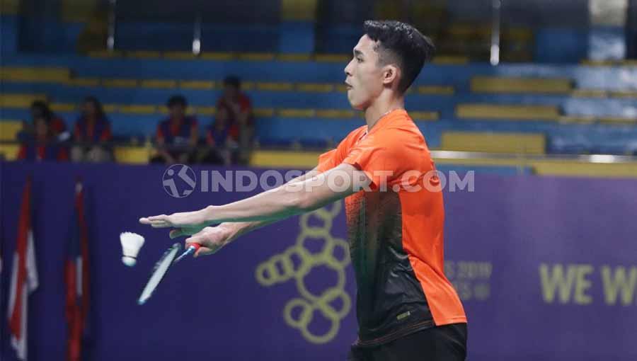 Pebulutangkis tunggal putra Indonesia Jonatan Christie berhasil mengalahkan wakil dari Malaysia Lee Zii Jia pada Final SEA Games 2019. - INDOSPORT