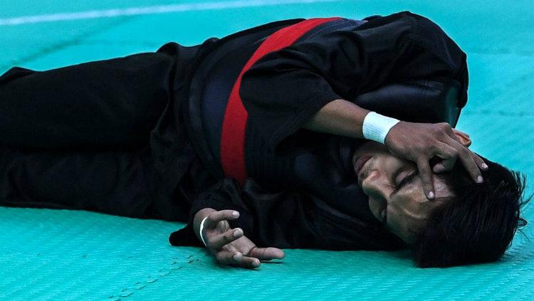 Atlet silat Malaysia di SEA Games 2019, Muhammad Faizul. - INDOSPORT
