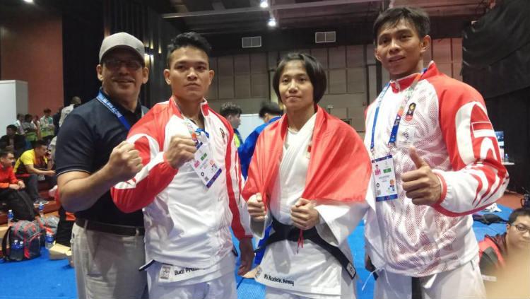 Tiga atlet judo Indonesia peraih medali SEA Games 2019: Budi Prasetyo, Ni Kadek Ani Pandini, Ikhsan Apriadi.
