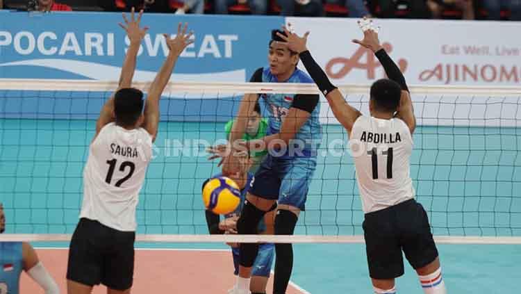 Timnas Bola Voli Indonesia menang 3-0 atas Filipina dalam laga terakhir babak penyisihan SEA Games 2019 di Philsport Arena, Jumat (06/12/19). Indonesia lolos ke semifinal dengan status juara grup ditemani tuan rumah. - INDOSPORT