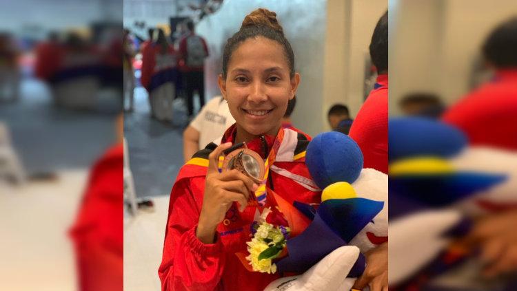 Atlet taekwondo Timor Leste, Amorin Imbrolia Araujo dos Reis, sukses mempersembahkan medali perunggu di cabang Taekwondo SEA Games 2019. - INDOSPORT