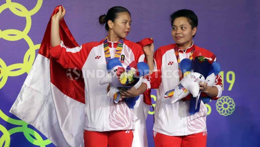 Ganda putri Indonesia, Greysia Polii/Apriyani kalahkan wakil Thailand dan rebut medali emas SEA Games 2019. - INDOSPORT