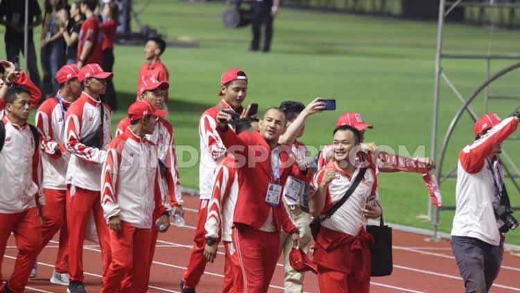 Sejumlah Kontingen Indonesia saat berjalan pada acara penutupan SEA Games 2019.
