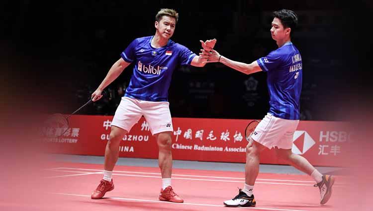 Kevin Sanjaya/Marcus Gideon berhasil mengalahkan pasangan China He Ji Ting/Tan Qiang di putaran kedua Indonesia Master 2020 dalam hasil pertandingan 21-19 dan 21-13. - INDOSPORT