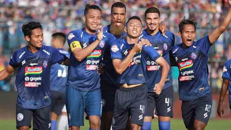 Para pemain Arema FC berselebrasi. Copyright: Arema FC