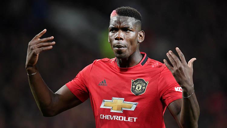 Phil Neville membahas performa Paul Pogba di klub Liga Inggris, Manchester United.