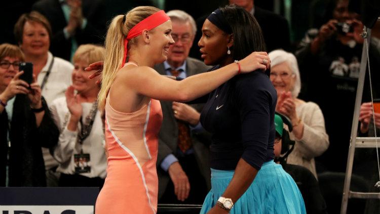 Caroline Wozniacki bersama dengan Serena Williams akan bermain di sektor ganda putri. - INDOSPORT