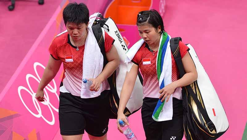 Pebulutangkis Indonesia Meilana Jauhari dan Greysia Polii. Copyright: ADEK BERRY/AFP/GettyImages