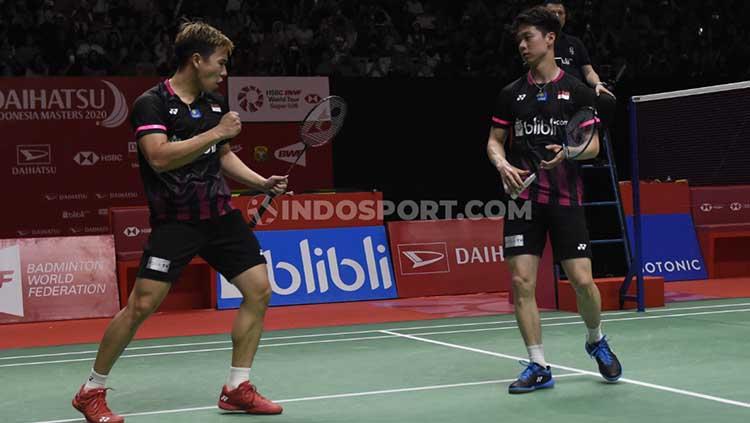 Pertarungan ganda putra terbaik Indonesia, Kevin Sanjaya/Marcus Gideon, melawan Aaron Chia/Soh Wooi Yik di Semifinal Indonesia Masters 2020 Copyright: Herry Ibrahim/INDOSPORT