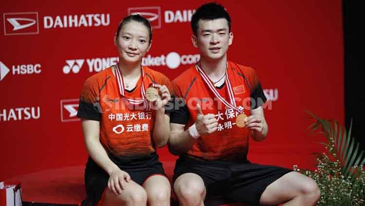 Ganda campuran China, Zheng Siwei/Huang Yaqiong mencatat rapor ajaib usai memenangkan gelar juara turnamen bulutangkis Kumamoto Masters 2023.