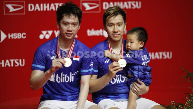 Raja ganda putra Indonesia, Ricky Subagja memberi wejangan kepada pasangan Kevin Sanjaya/Marcus Gideon jelang Olimpiade Tokyo 2020. - INDOSPORT