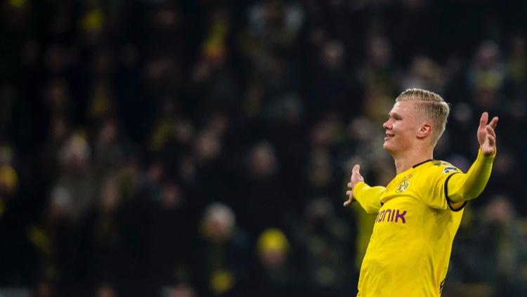 Erling Haaland merayakan golnya saat pertandingan Bundesliga antara Borussia Dortmund vs Koln, Sabtu (25/01/20) dini hari WIB.