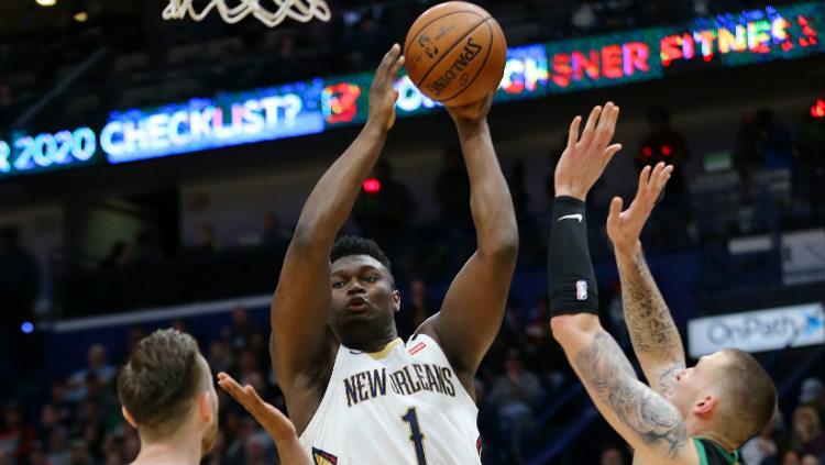 Zion Williamson dalam laga NBA New Orleans Pelicans vs Boston Celtics. Copyright: Jonathan Bachman/Getty Images