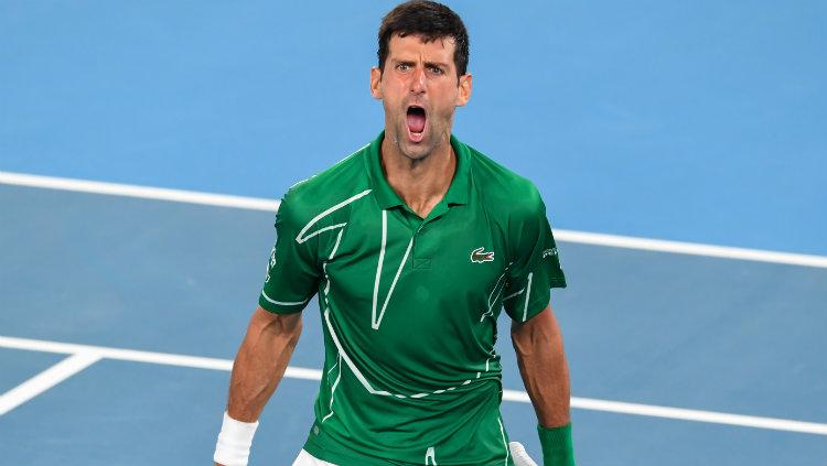 Novak Djokovic mengalahkan Roger Federer di semifinal Australia Terbuka 2020. - INDOSPORT