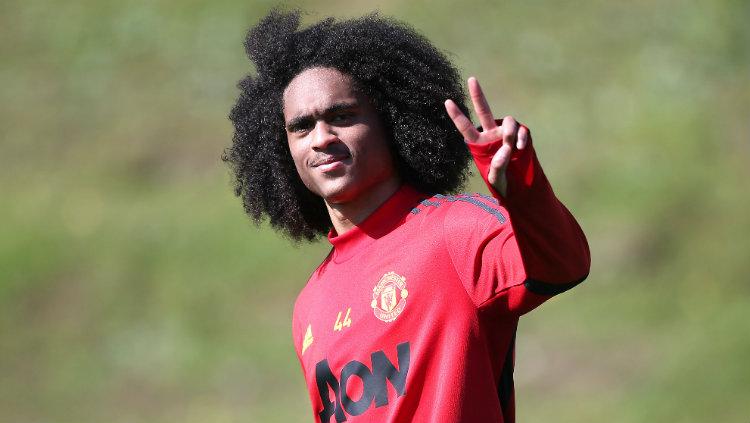 Pemain muda Manchester United, Tahith Chong, dikabarkan tinggal selangkah lagi untuk merapat ke Inter Milan dan bukan ke AC Milan di bursa transfer musim panas. Copyright: Matthew Peters/Manchester United via Getty Images