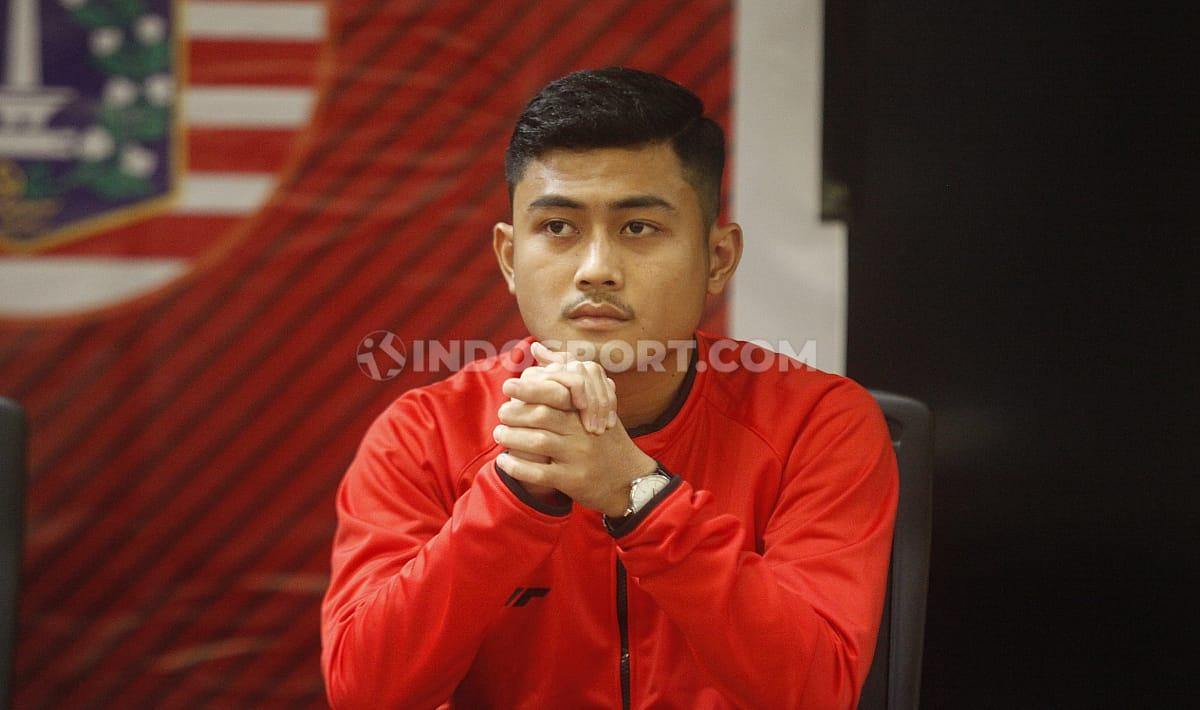 Pemain muda Persija Jakarta, Adrianus Dwiki Arya Purnomo mengaku sudah rindu dengan suasana latihan timnya. - INDOSPORT