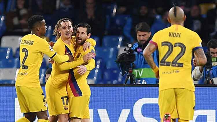 Selebrasi para pemain Barcelona saat Antoine Griezmann mencetak gol penyeimbang saat melawan Napoli di pertandingan babak 16 besar Liga Champions 2019-2020 leg pertama di San Paolo.