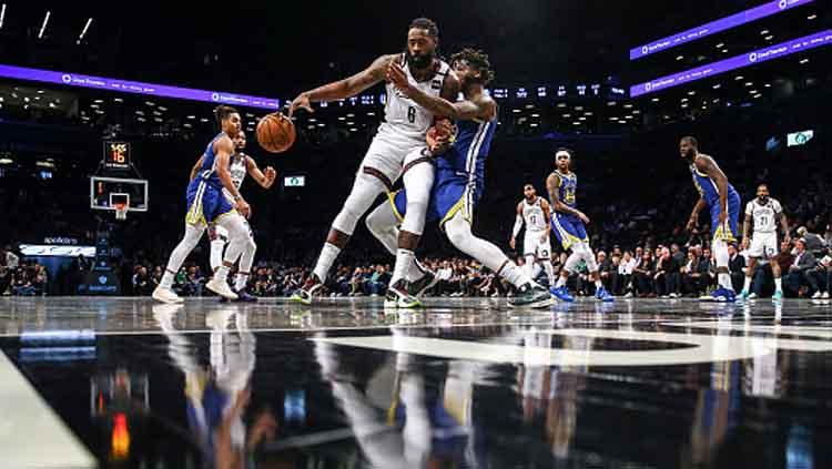 Pertandingan NBA antara Golden State Warriors vs Brooklyn Nets yang masih tidak diperkuat oleh Stephen Curry. Copyright: Mike Stobe/GettyImages