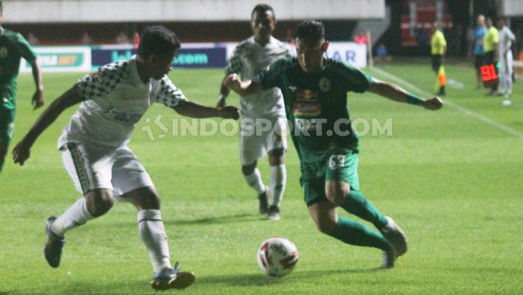 Derry Rachman dalam laga Liga 1, PSS Sleman vs Tira Persikabo, Minggu (08/03/20). Copyright: Ronald Seger Prabowo/INDOSPORT