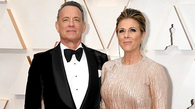 Tom Hanks dan istri, Rita, positif terjangkit virus corona. - INDOSPORT