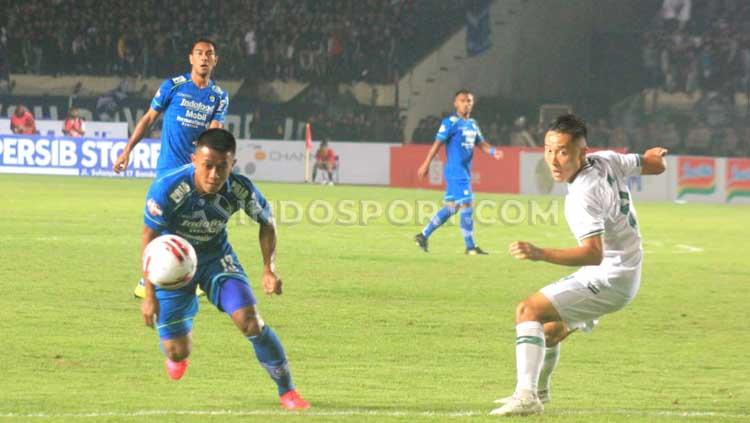 Persib Bandung tercatat tidak pernah menelan kekalahan sama sekali di setiap laga perdana era kompetisi Liga 1 bergulir dari 2017 lalu. - INDOSPORT