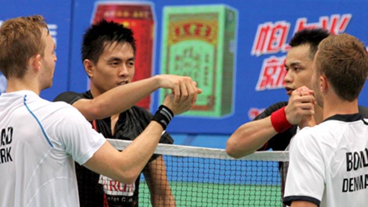 Pasangan Indonesia, Hendra Aprida Gunawan/Yonathan Suryatama Dasuki, saat menghadapi wakil Denmark, Rasmus Bonde/Mads Conrad-Petersen, di World Championships 2013 Copyright: PBSI