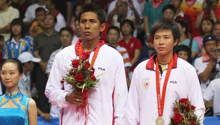 Campuran Ganda Indonesia meraih medali perak Nova Widianto dan Liliyana pada Olimpiade Beijing, (17082008) di Beijing, Cina. Copyright: Ezra Shaw/Getty Images