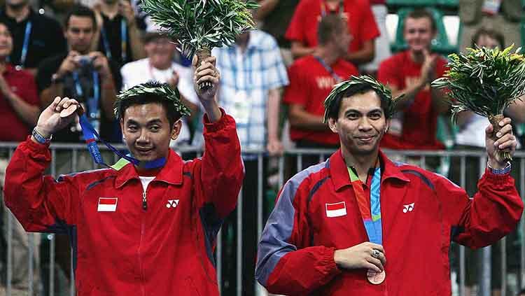 Badminton Lovers (BL) Indonesia dibuat ketar-ketir menyusul munculnya isu Eng Hian (kiri) bakal dibajak menjadi pelatih para pebulutangkis Prancis. - INDOSPORT