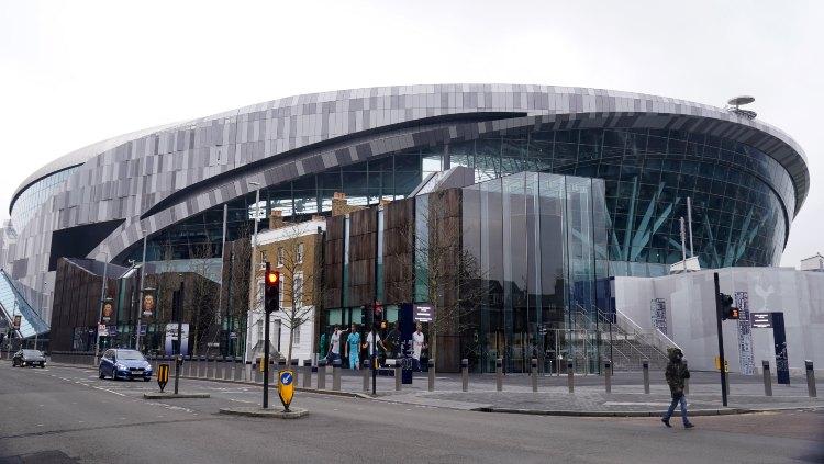 Stadion Tottenham Hotspur menjadi stadion pertama klub Liga Inggris yang dites uji coba ditengah wabah Virus Corona. - INDOSPORT
