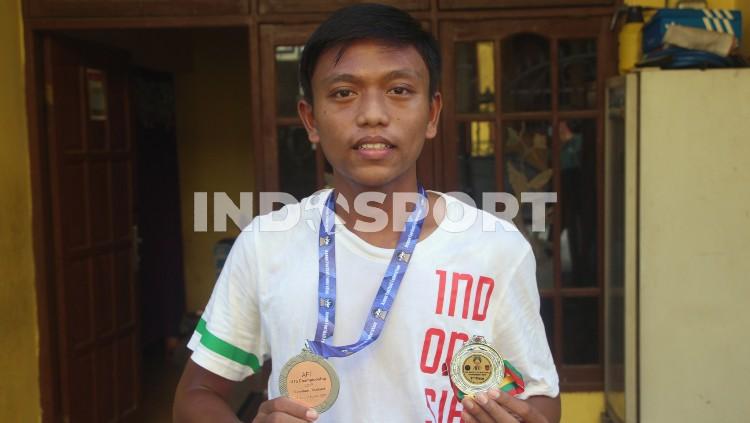 Rangga Aditya Saputra tetap berolahraga meskipun ada pandemi Covid-19. - INDOSPORT