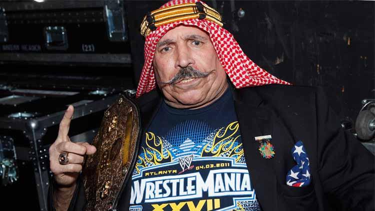 Hossein Khosrow Ali Vaziri atau The Iron Sheik merupakan salah satu legenda hidup WWE, yang juga dikenal sebagai musuh besar Hulk Hogan. - INDOSPORT