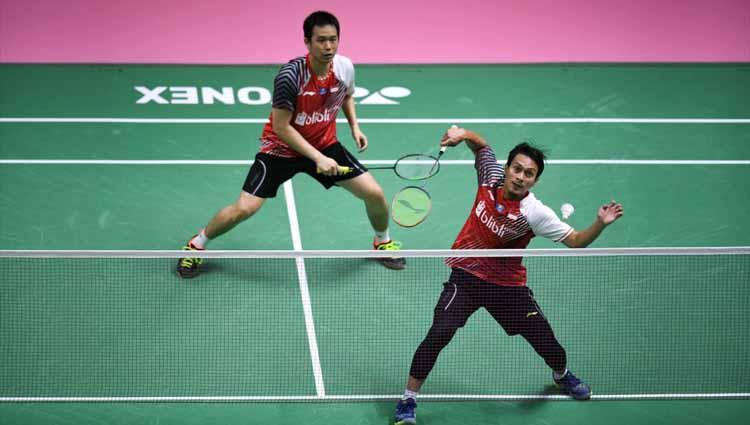 Ganda putera Indonesia, Mohammad Ahsan/Hendra Setiawan Sukamuljo saat melawan Li Junhui dan Liu Yuchen dari China di Thomas Cup 2018 di Bangkok, Thailand.